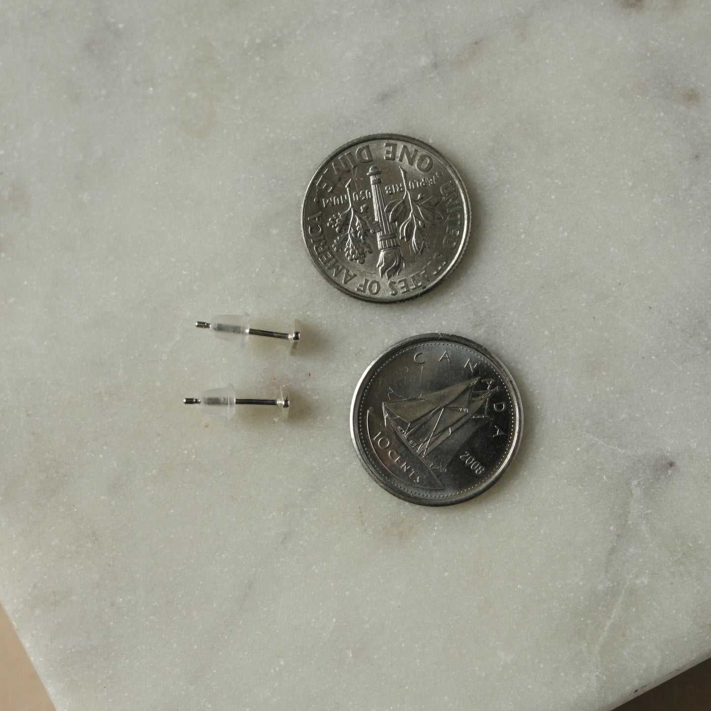 Tiny Sterling Silver Triangle Studs