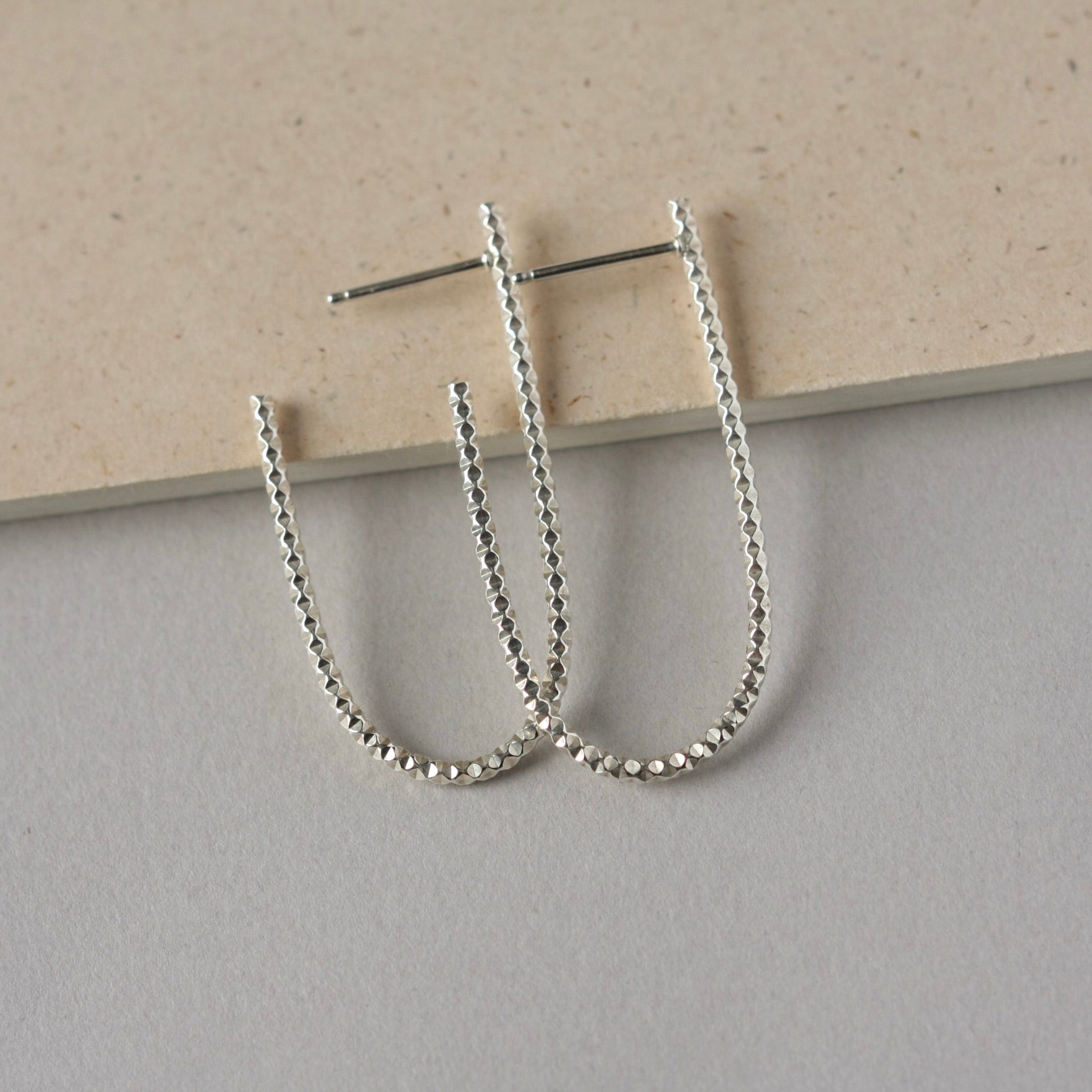 Long Sparkly Silver Oval Hoop Earrings