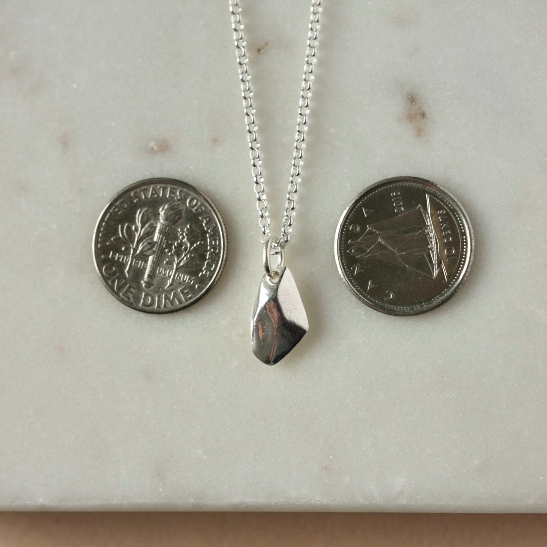 Sterling Silver Faceted Charm Necklace