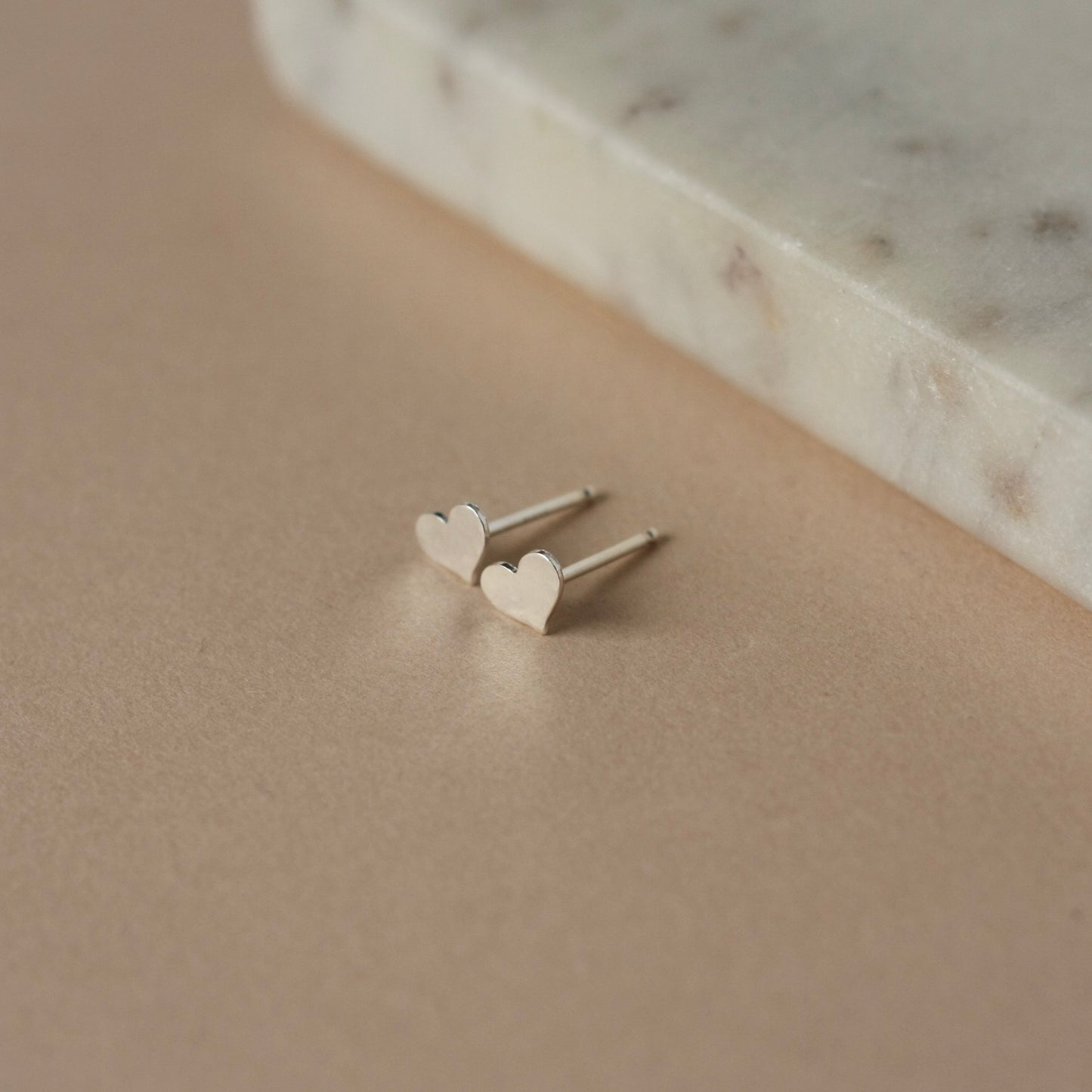 Tiny Hammered Sterling Silver Heart Studs